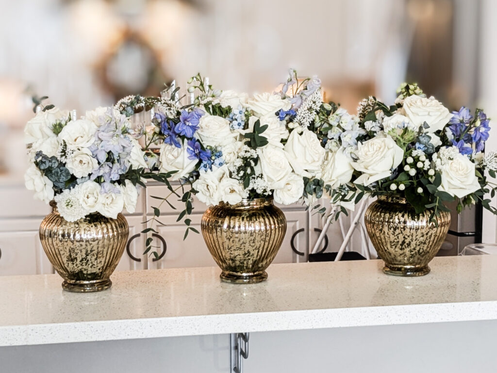 Bouquets in vases for St. Louis Wedding.