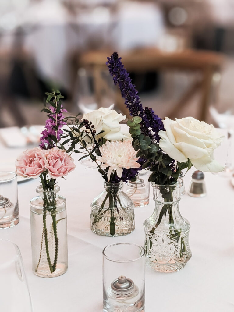 Bud vase centerpieces for a St. Louis Event at Missouri Botanical Gardens