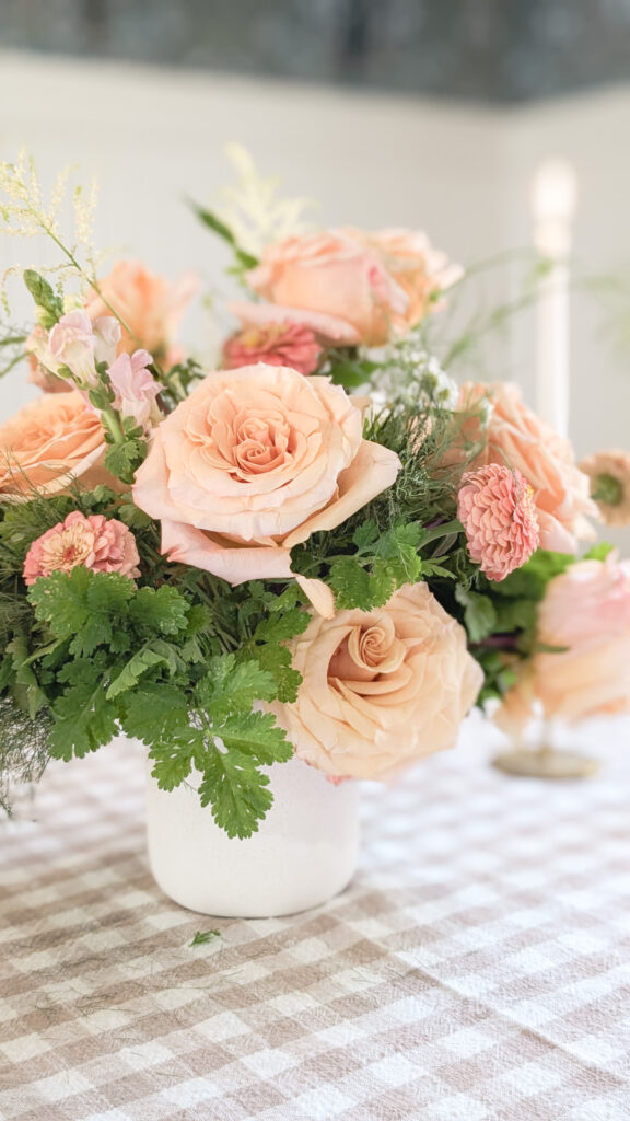 Peach rose centerpiece designed by St. Louis wedding florist, SunCrest Blooms