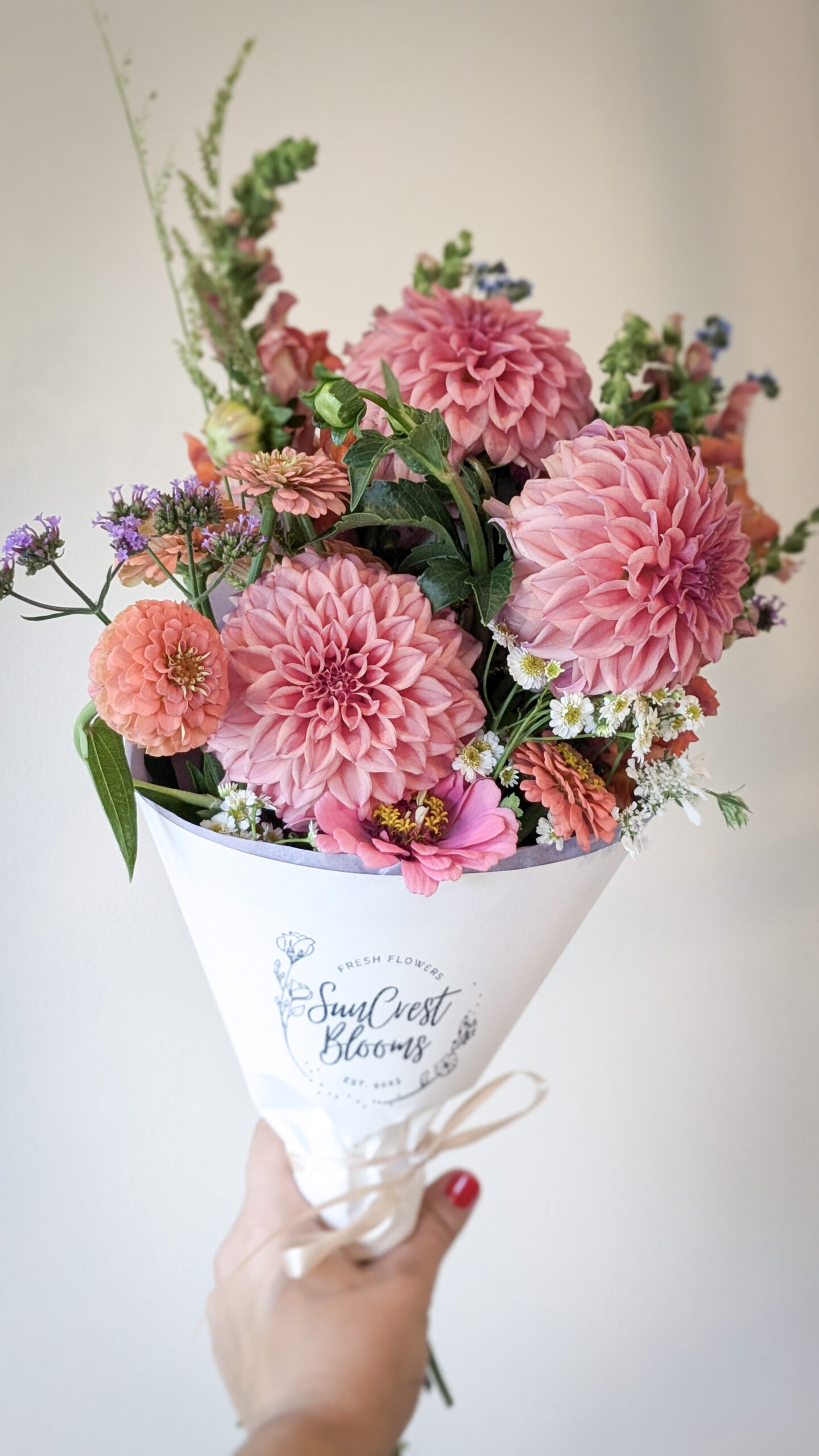 Mixed bouquet subscription featuring dahlias, zinnias and snapdragons. The perfect gift for a loved one.