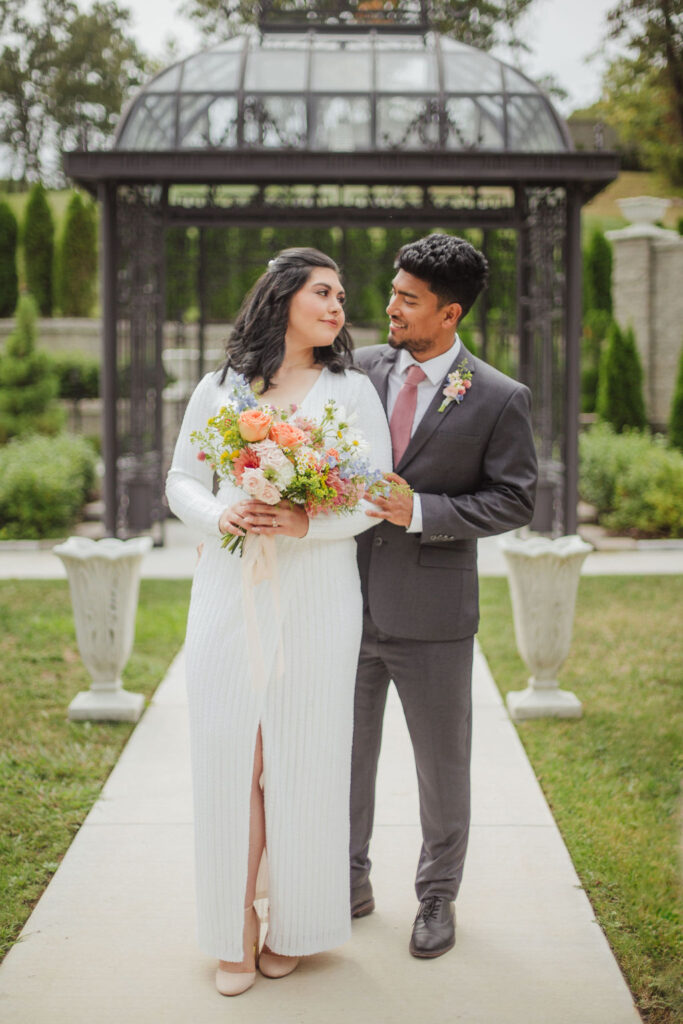 Garden-style floral design with bride and groom in St. Louis, MO